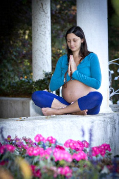 Melody meditating while pregnant