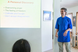 Ananda Meditation Teacher Training Gyandev laughing with class.