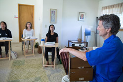 Ananda Meditation Teacher Training -Gyandev playing harmonium.