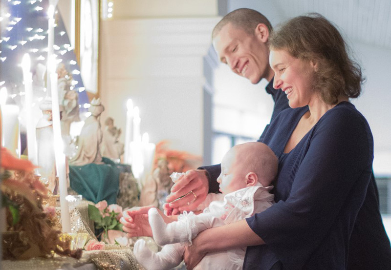baby at alter - Expanding Light Retreat family program family christmas with Badri and Erin
