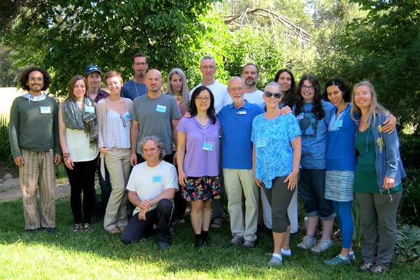 Karma Yoga spiritual interns during group hug Karma Yoga spiritual interns during group hug