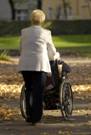 Caregiver with wheel chair