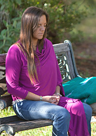 Lady in pink meditating