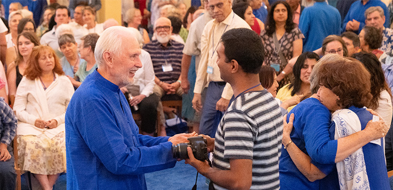 Jyotish-and-Devi-shaking hands