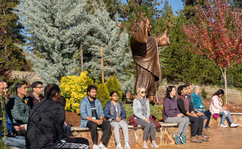 group meditation under Yogananda Statue