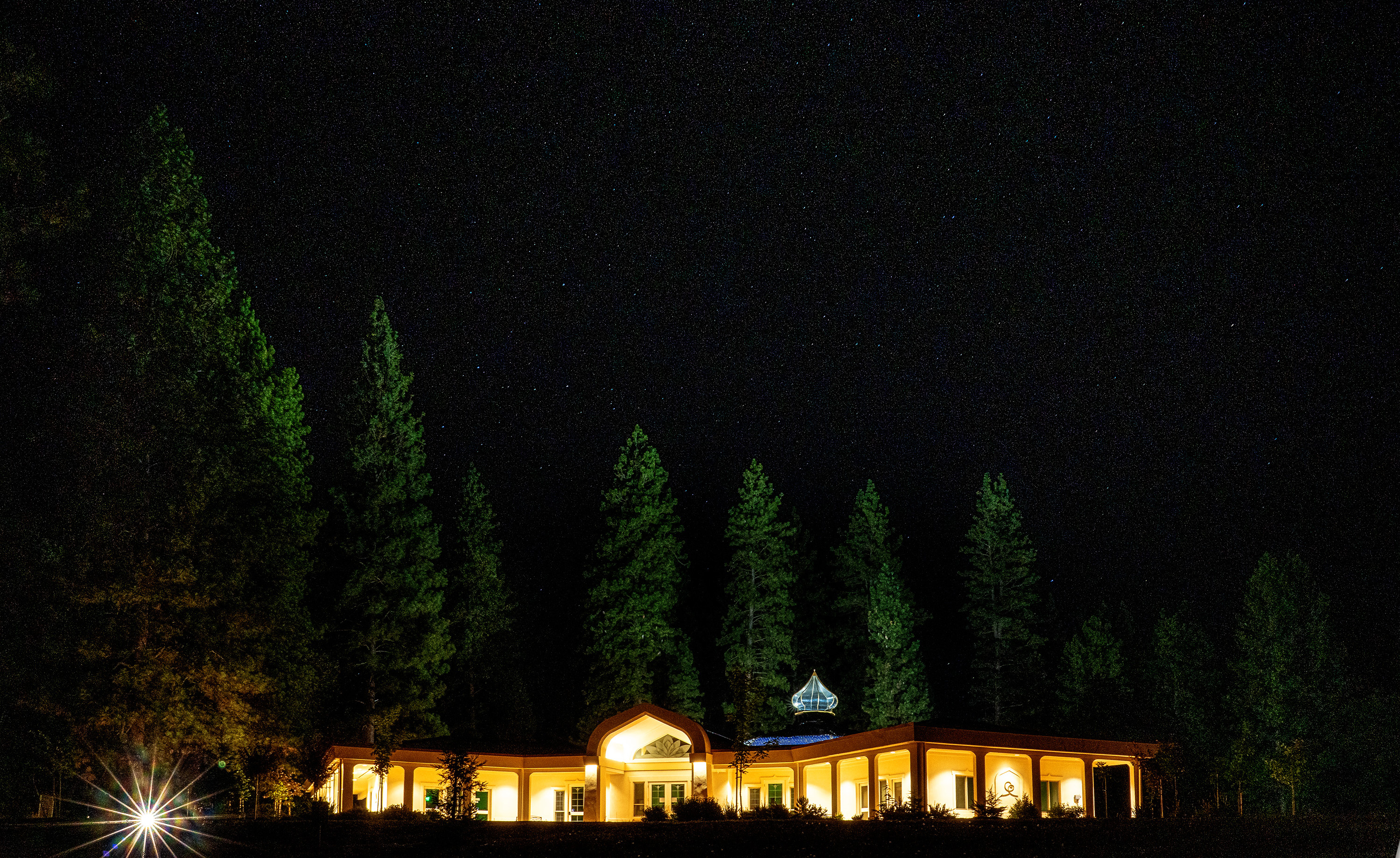 The Ananda Village temple in starry sky on Pilgrimage with The Expanding Light Retreat