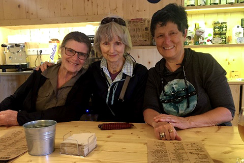 Ananda Spiritual Travels-Camino Pilgrimage-Three ladies smiling at breakfast