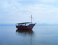 boat floating on Sea of Galilee
