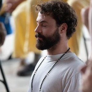 UUP-Sustainable-Spirituality--guy in group meditation.jpg